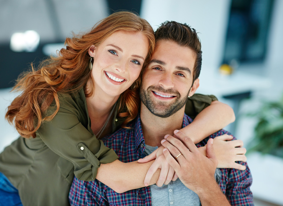 Affectionate young couple embracing each other