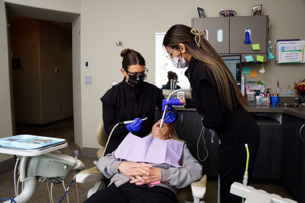 Dental team treating patient