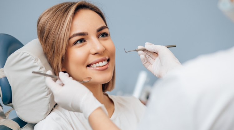 Patient receiving professional teeth cleaning at Vistoso Dental Partners in Oro Valley, AZ, as part of preventive dentistry for optimal oral health.